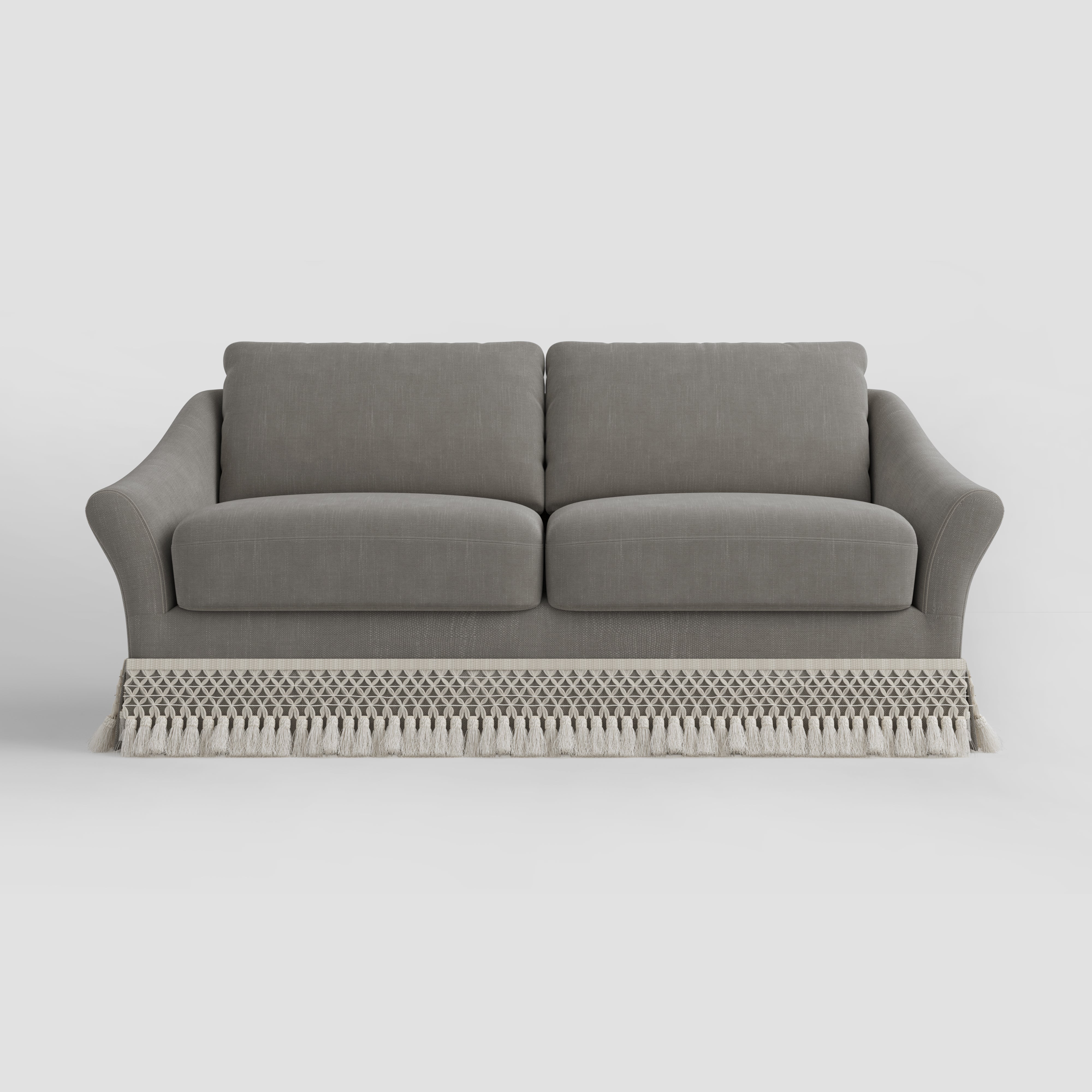 Curved Arm Sofa with Fringed Trim and Removable Cover