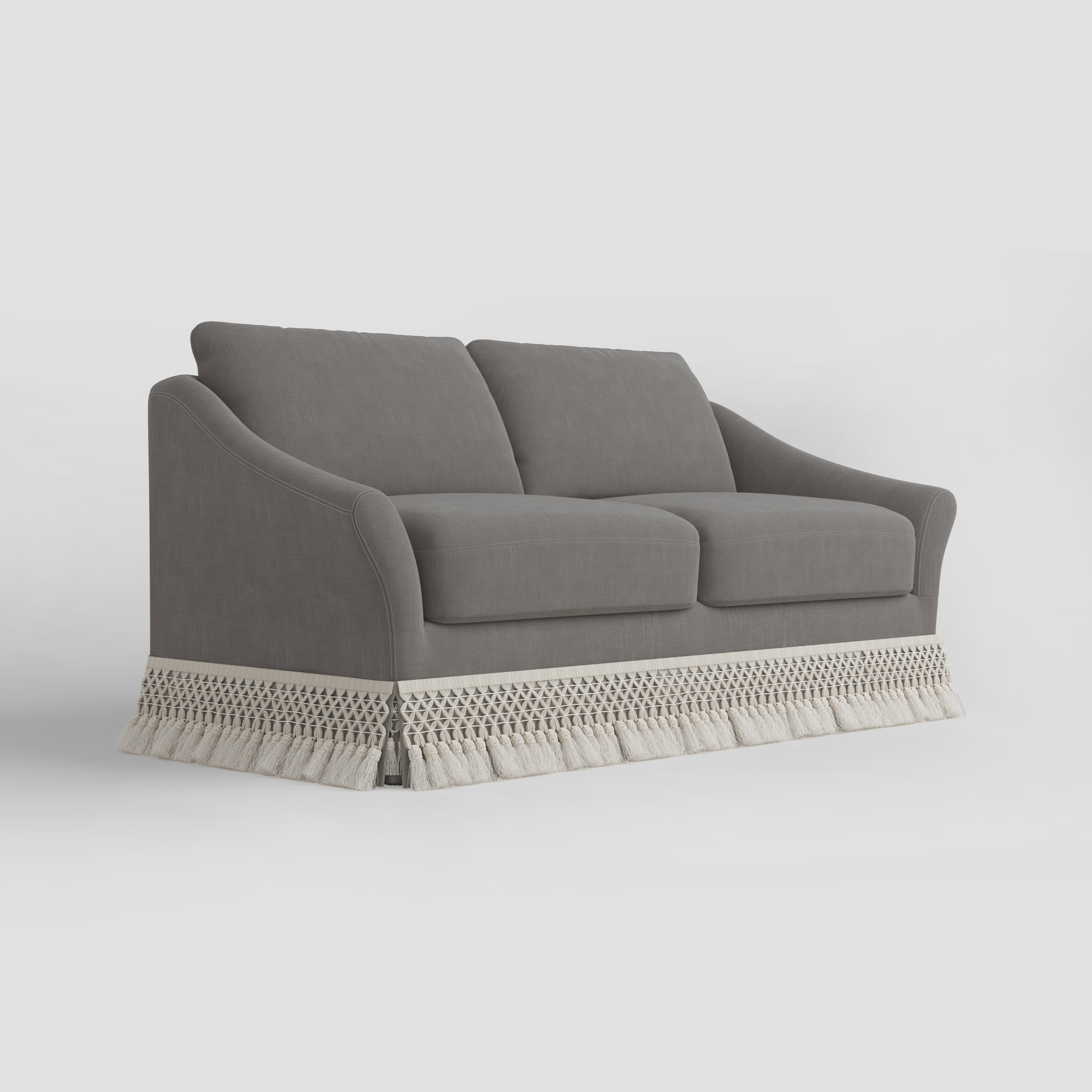 Curved Arm Sofa with Fringed Trim and Removable Cover