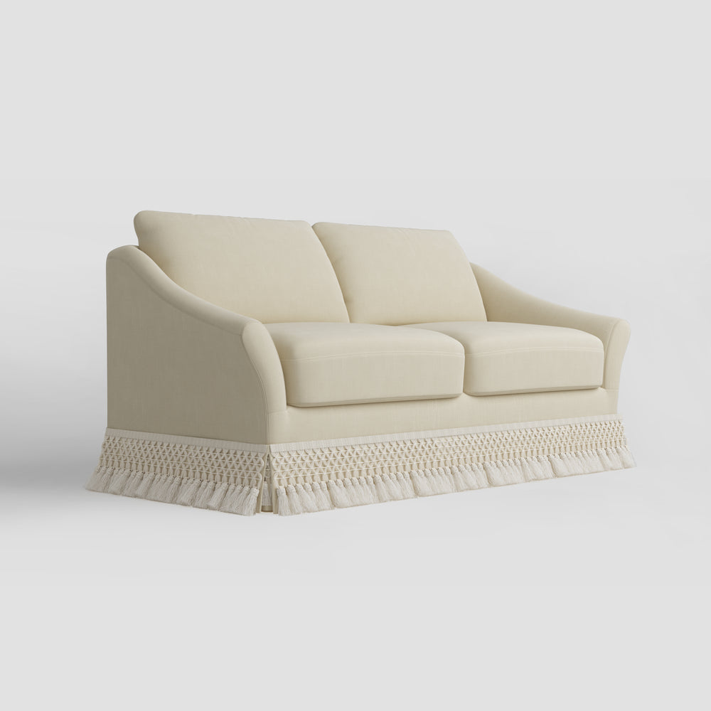 Curved Arm Sofa with Fringed Trim and Removable Cover