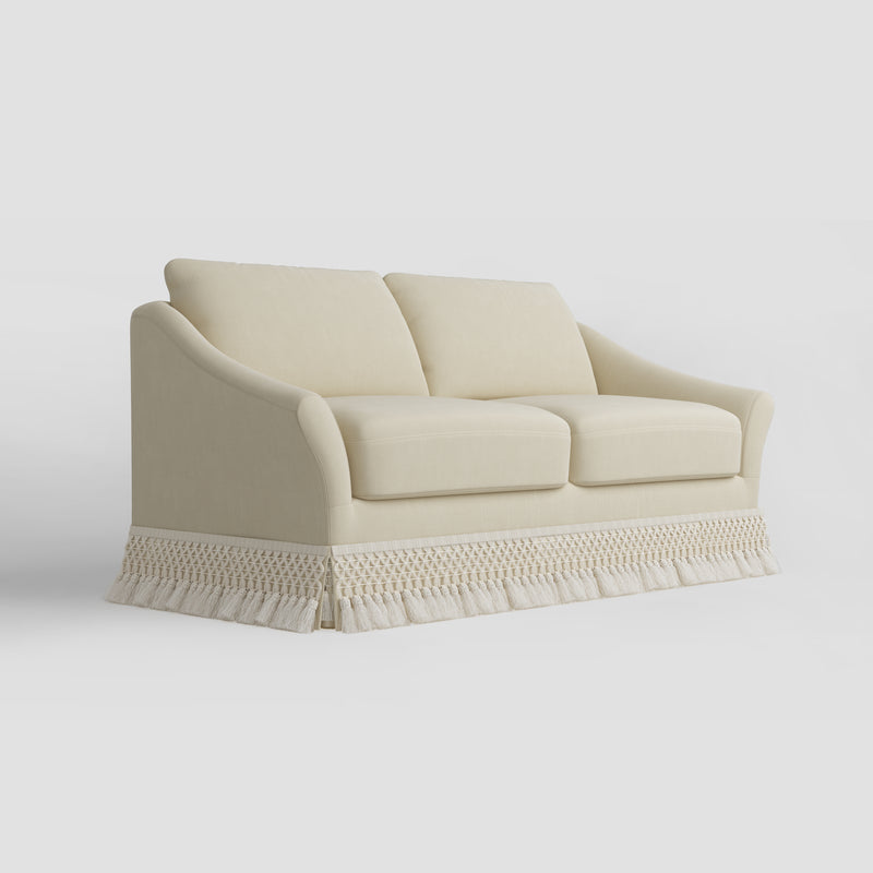 Curved Arm Sofa with Fringed Trim and Removable Cover